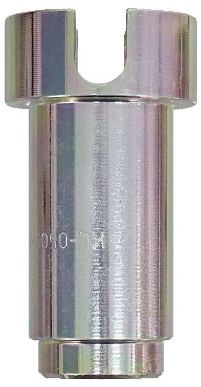 Un outil métallique cylindrique avec un sommet creux et une découpe en forme de U sur une extrémité, probablement utilisé pour des applications mécaniques ou de plomberie.