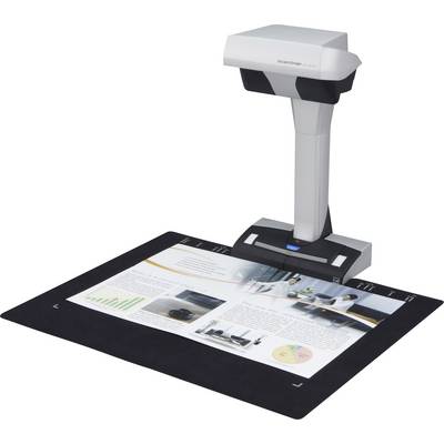 Un scanner de documents capturant une page de magazine avec des graphiques et des images sur un tapis noir.