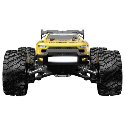 Buggy RC tout-terrain 4WD noir avec pneus surdimensionnés et suspension rouge, présenté sur fond blanc.