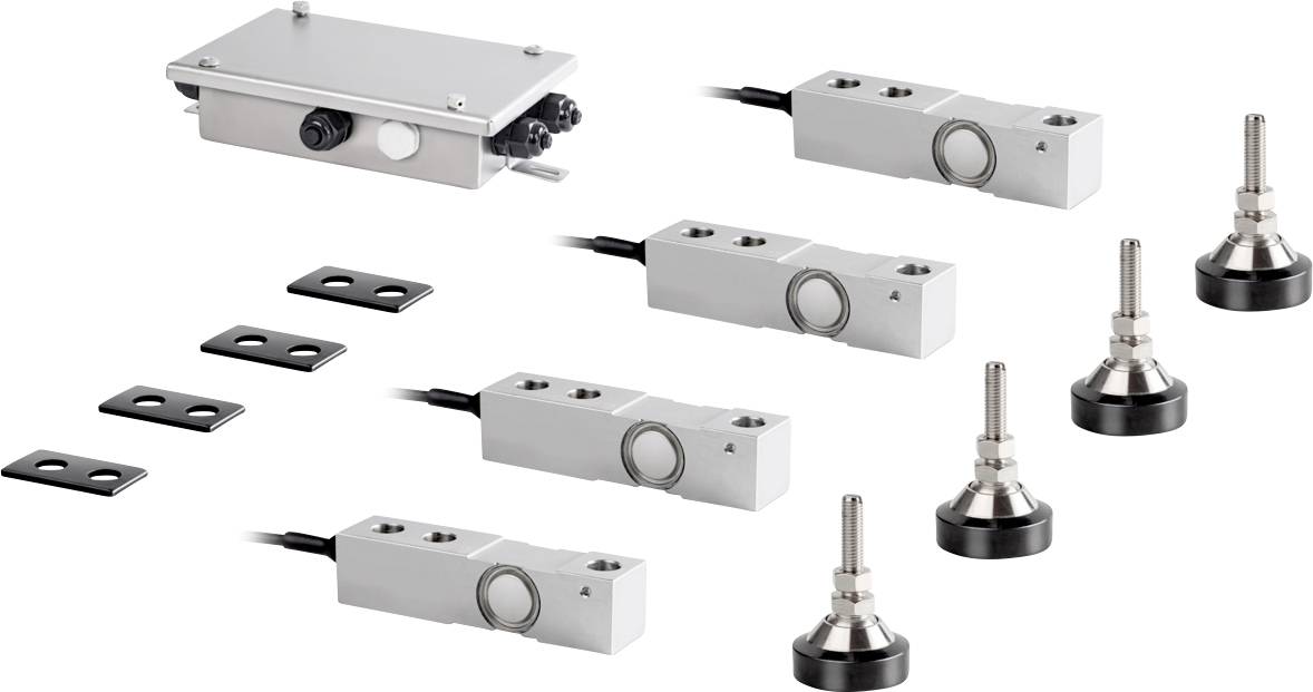 Un ensemble de composants métalliques industriels, comprenant quatre cellules de charge, une boîte de jonction et quatre pieds réglables, utilisés pour les systèmes de pesage.