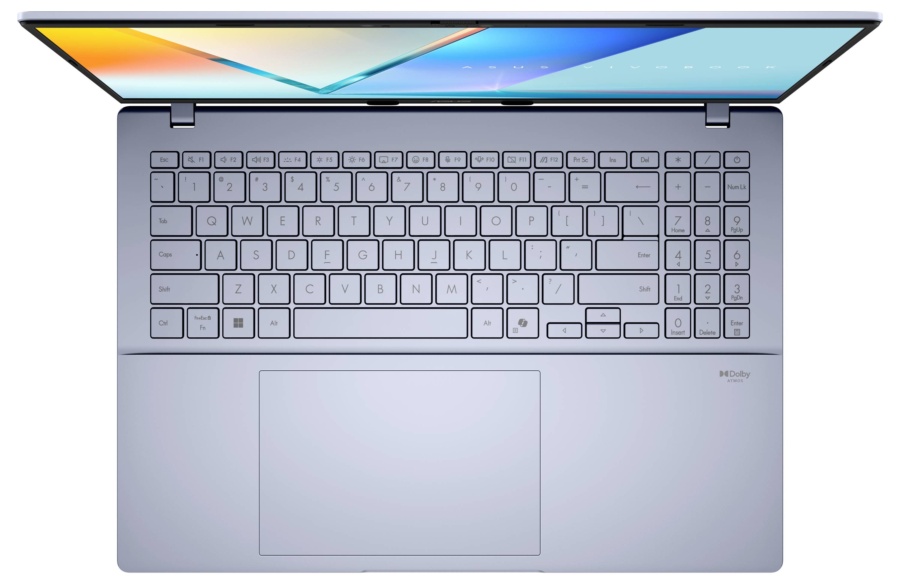 Un ordinateur portable en argent vu de dessus, montrant un clavier complet et un grand pavé tactile, avec un écran coloré affichant des formes géométriques.