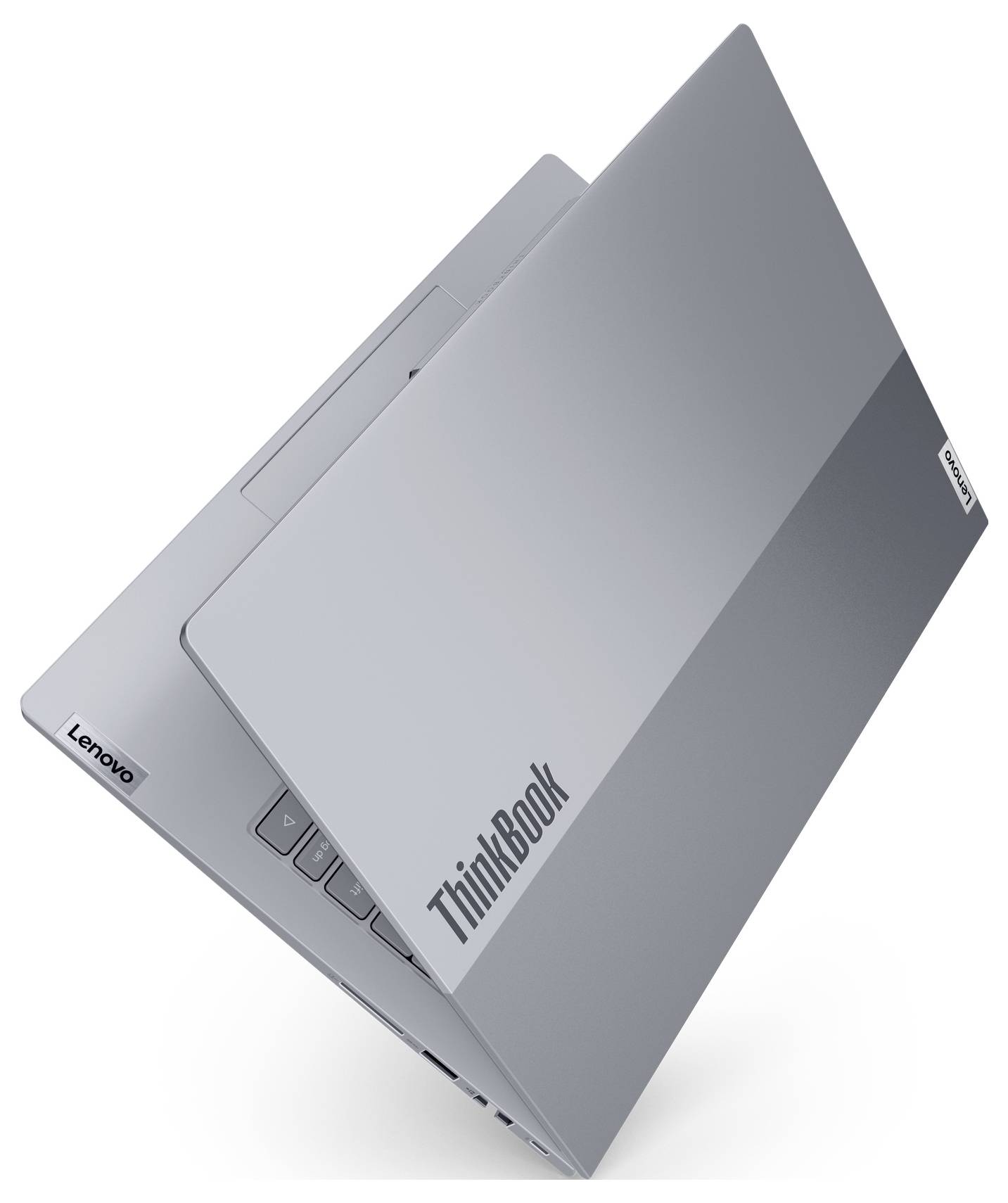 Ordinateur portable Lenovo ThinkBook argenté présenté fermé selon un angle sur un fond blanc, avec les logos ThinkBook et Lenovo visibles.