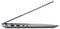 Ordinateur portable ultrabook présenté en vue de profil avec le clavier ouvert, mettant en évidence son profil fin et les ports situés sur le côté gauche, notamment USB, HDMI, USB-C et prise audio.