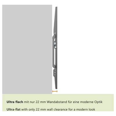 Une vue latérale d'un support mural mince montrant le téléviseur positionné ultra-plat avec seulement 22 mm de dégagement par rapport au mur, mettant l'accent sur un look moderne.
