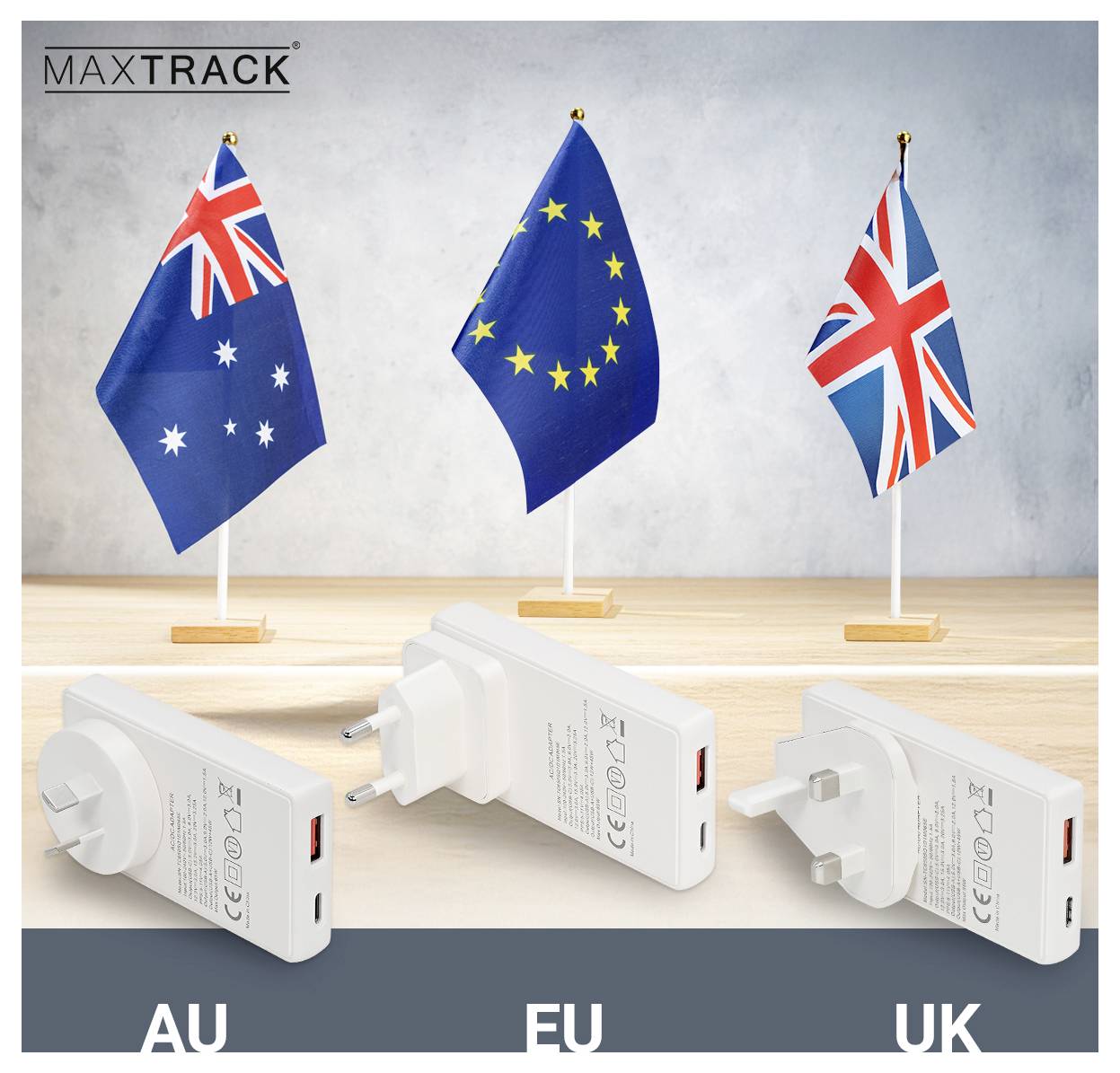 Adaptateurs de voyage de marque « MAX TRACK » pour l'AU, l'UE et le Royaume-Uni. Au-dessus de chaque adaptateur, les drapeaux correspondants de l'Australie, de l'Union européenne et du Royaume-Uni sont affichés.