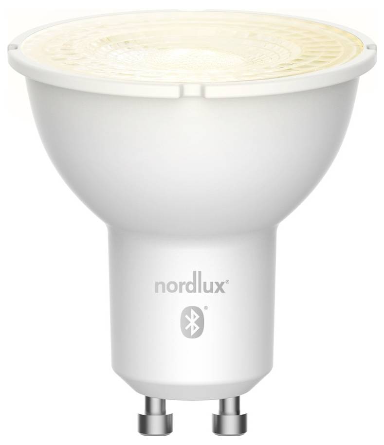 Ampoule LED blanche avec une base GU10, étiquetée « nordlux » avec un symbole Bluetooth, sur un fond uni.