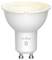 Ampoule LED blanche avec une base GU10, étiquetée « nordlux » avec un symbole Bluetooth, sur un fond uni.