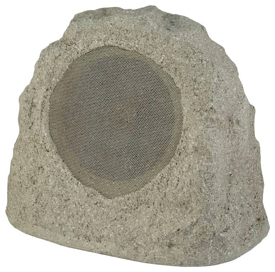Un haut-parleur extérieur de forme rocheuse conçu pour se fondre dans l'environnement naturel, doté d'une grille en maille à l'avant.