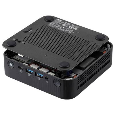 Un mini PC compact avec son couvercle supérieur soulevé, exposant les composants internes et les ports frontaux incluant l'USB et les boutons d'alimentation.
