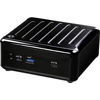 « Un mini PC noir avec divers ports incluant USB et des prises audio, posé sur une surface réfléchissante. »