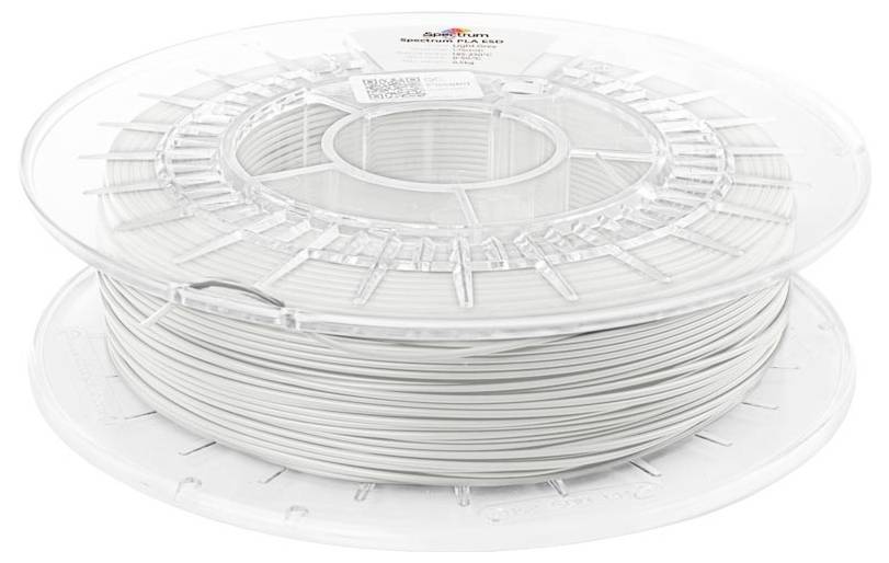 Bobine de filament blanc pour imprimante 3D enroulée sur une bobine en plastique transparent, présentée dans son emballage produit.