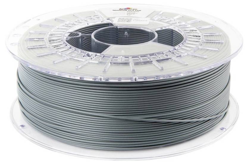 Une grande bobine de câble ou fil gris enroulé sur une bobine en plastique transparent, présenté sur un fond blanc.