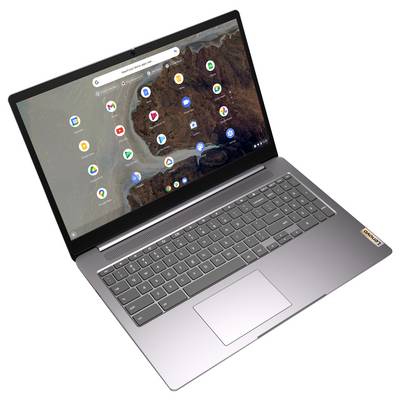Un ordinateur portable affichant diverses icônes d'applications sur son écran, y compris les applications Google. L'appareil est argenté avec un clavier complet et un pavé tactile.