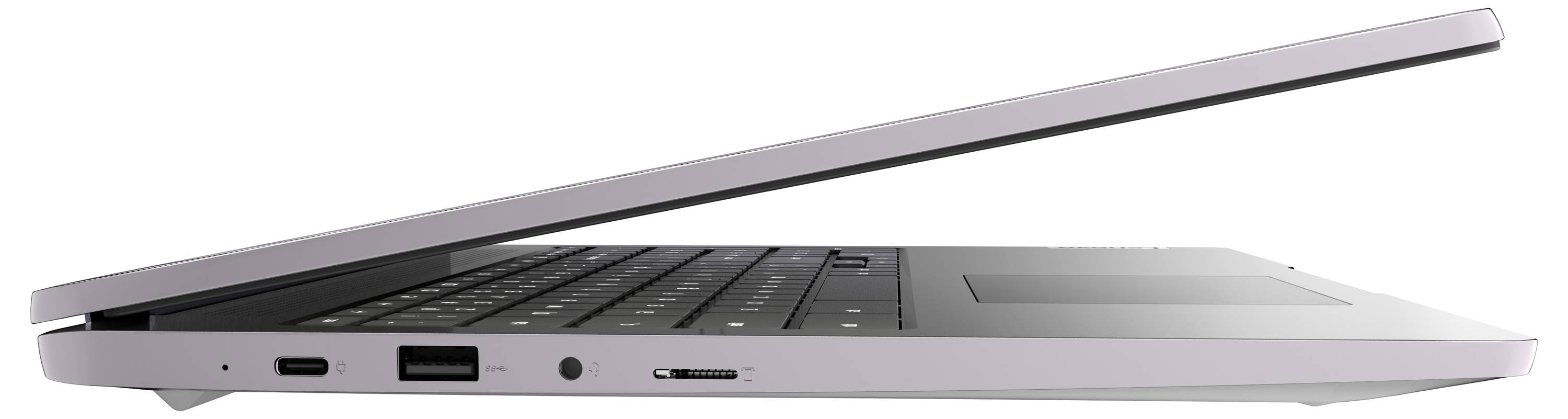 Ordinateur portable argenté élégant partiellement fermé, montrant les ports latéraux et le bord du clavier, sur un fond blanc.