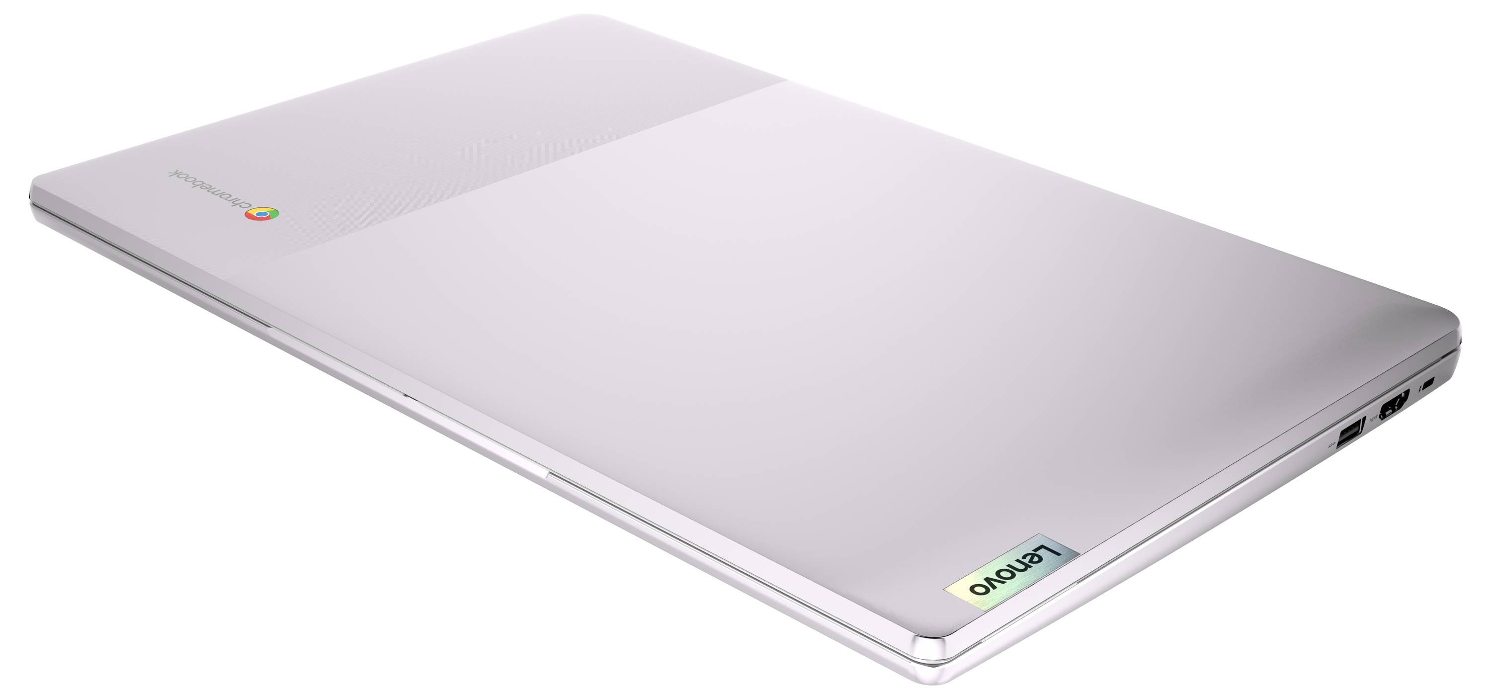Chromebook Lenovo argenté fermé avec logo dans le coin supérieur, vue en angle, montrant un profil fin et des ports sur le côté.
