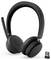 Casque sans fil noir avec un microphone à bras, des coussinets auriculaires rembourrés et un dongle USB pour la connectivité, destiné à la communication ou à l'audio.