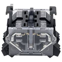 Vue rapprochée d'un commutateur de clavier mécanique, montrant les composants internes et le mécanisme à ressort, utilisé pour la rétroaction tactile lors de la dactylographie.