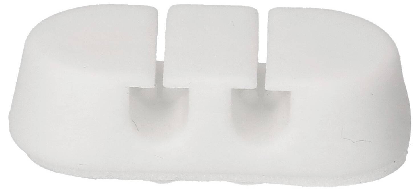 Un bloc de plastique blanc avec deux rainures parallèles conçu pour maintenir les câbles.