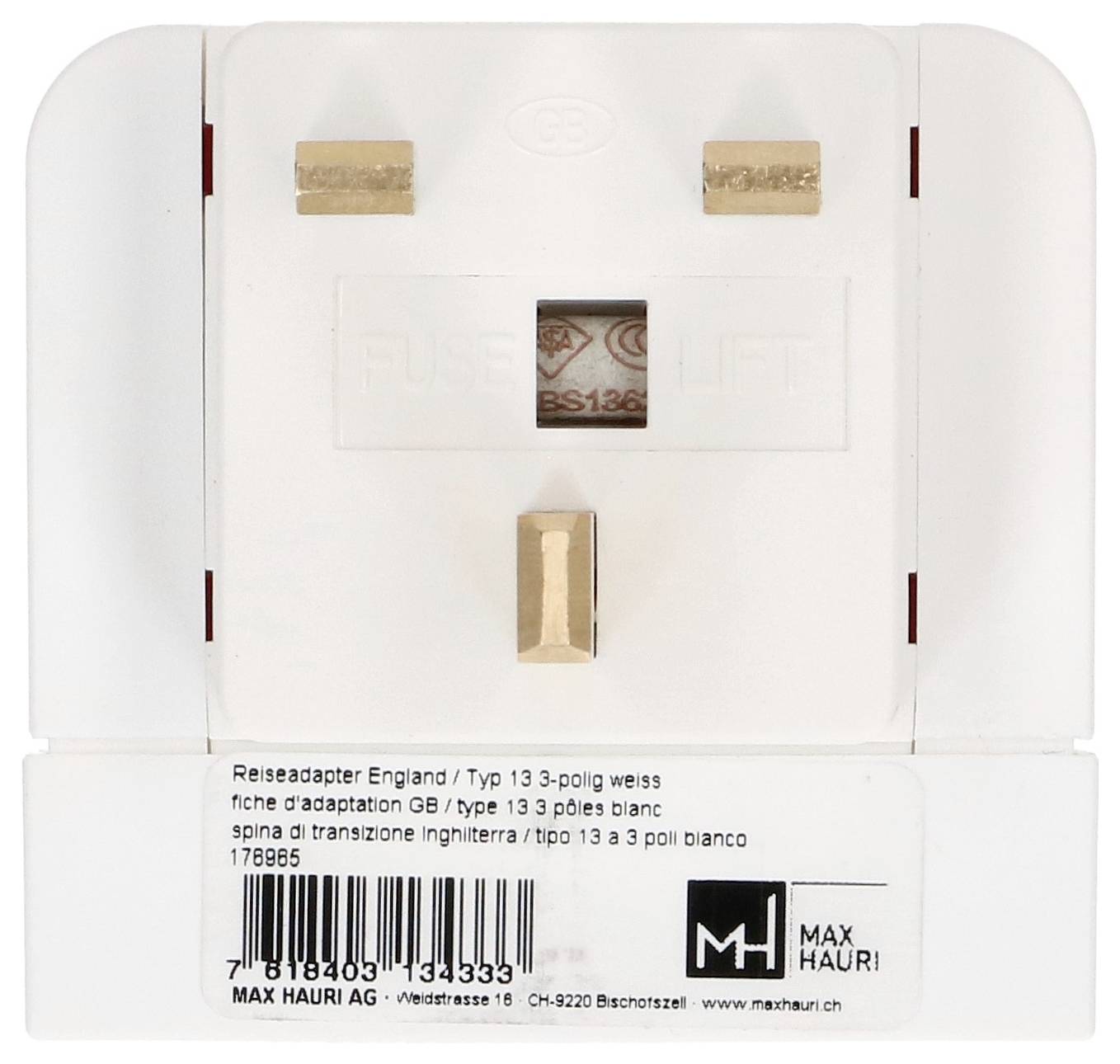 Adaptateur de voyage Angleterre/Type 13, 3 pôles blanc. Étiquette avec marque « Max Hauri ». Contient une fiche trois broches britannique avec des instructions de sécurité.