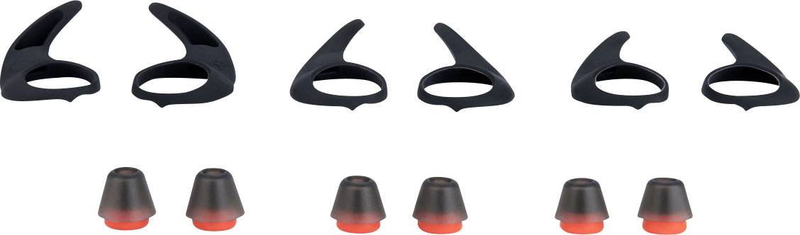 Collection d'embouts auriculaires noirs de diverses tailles avec intérieurs rouges.