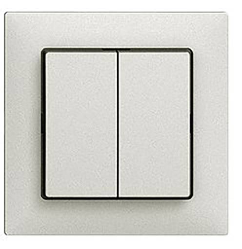 « Un interrupteur double sur une plaque murale beige. »