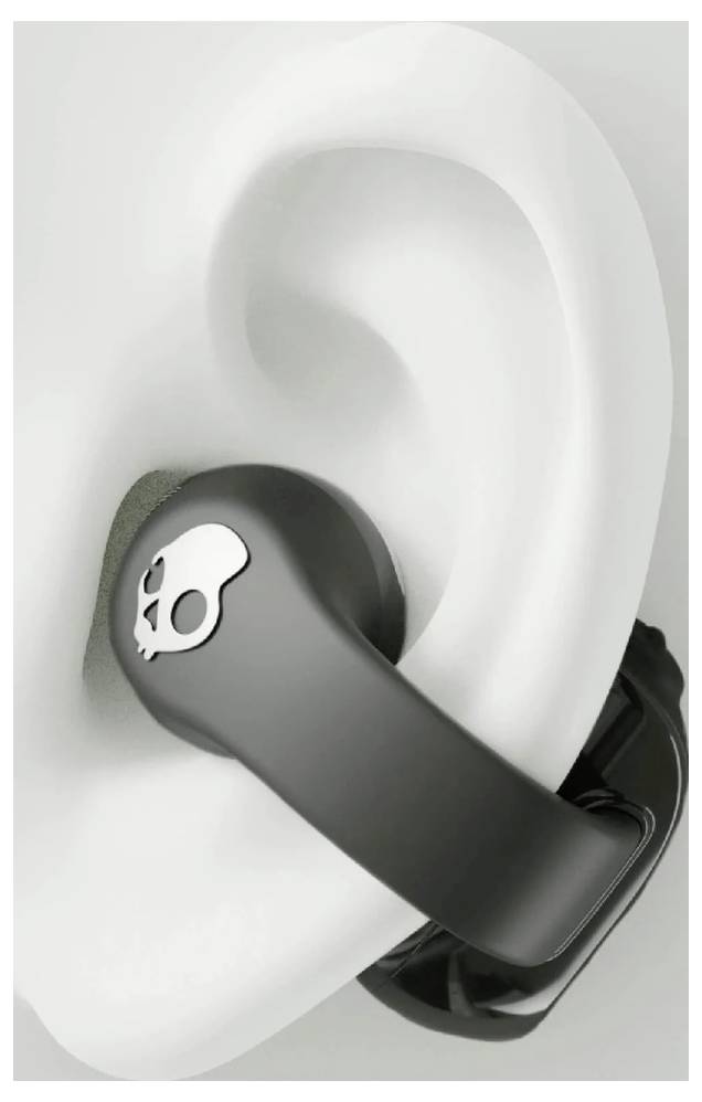 Écouteur noir avec un logo de crâne dans l'oreille d'une tête de mannequin.