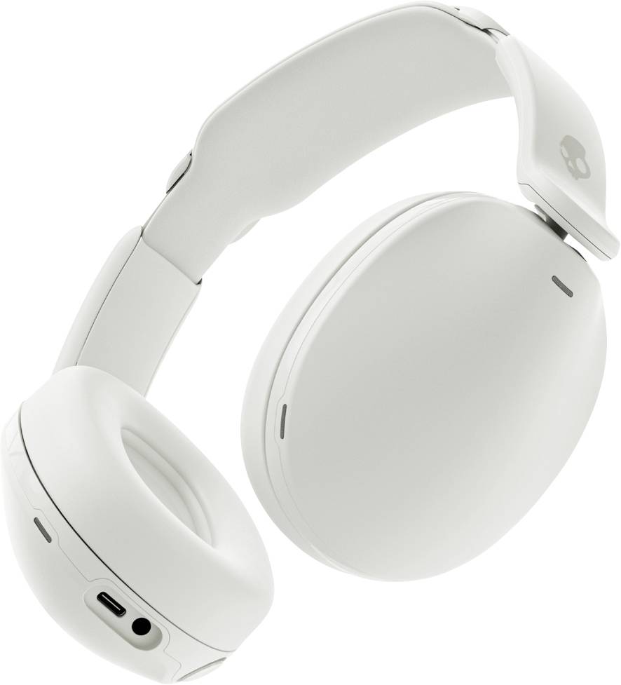 Casque audio sans fil supra-auriculaire blanc avec coussinets auriculaires rembourrés et arceau ajustable, équipé d'un port de charge sur le côté gauche.