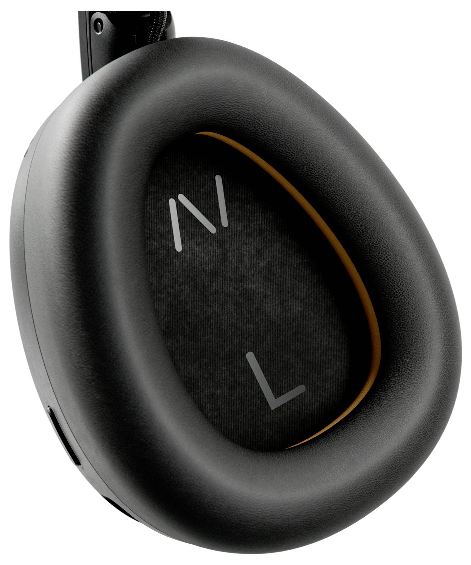 Gros plan d'une écoutille d'écouteur supra-auriculaire noir montrant le marquage du côté gauche/droit et l'anneau d'accent orange.