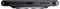 Une vue rapprochée du bord inférieur d'un smartphone montrant un port de recharge, des trous de haut-parleur et un microphone sur une armature lisse et sombre.