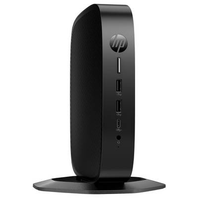 Un élégant mini-ordinateur de bureau HP noir disposé verticalement, doté de plusieurs ports USB et d'un design fin et compact.