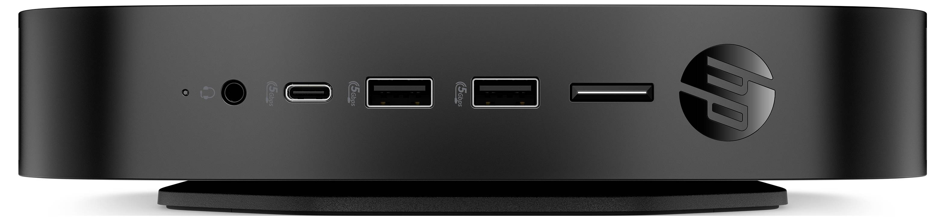 Un appareil électronique noir avec un bouton d'alimentation, un port USB-C, deux ports USB et une prise audio sur le panneau avant.