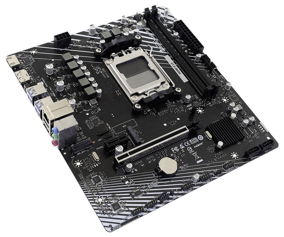 Carte mère ATX noire avec socket CPU, emplacements RAM, slot PCIe, ports d'E/S arrière et dissipateurs thermiques sur fond blanc.