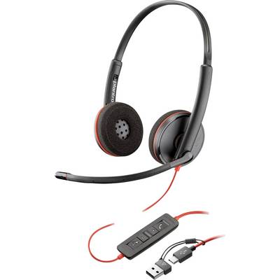Un casque filaire noir et orange avec un bandeau ajustable, un microphone et un contrôle de volume en ligne. Comprend des connexions USB et une prise audio.