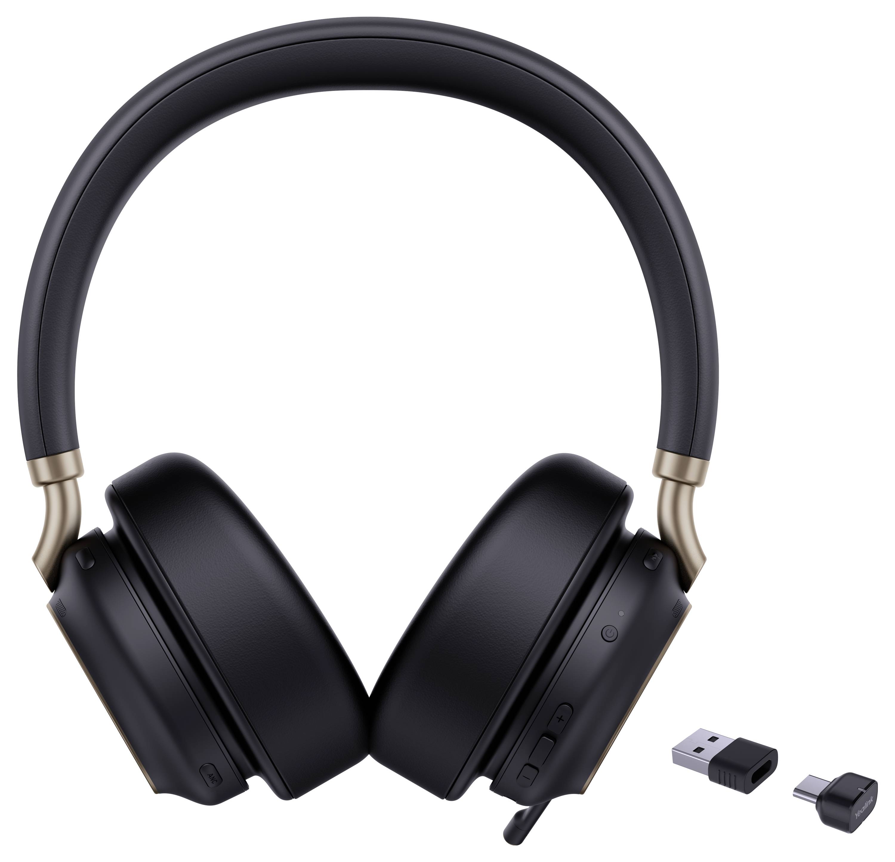 Casque audio sans fil supra-auriculaire noir avec des accents dorés, présenté aux côtés d'un récepteur USB et d'un petit adaptateur, adapté aux connexions audio.
