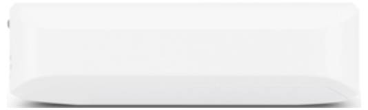 Un objet rectangulaire blanc, ressemblant à une gomme, sur un fond uni.