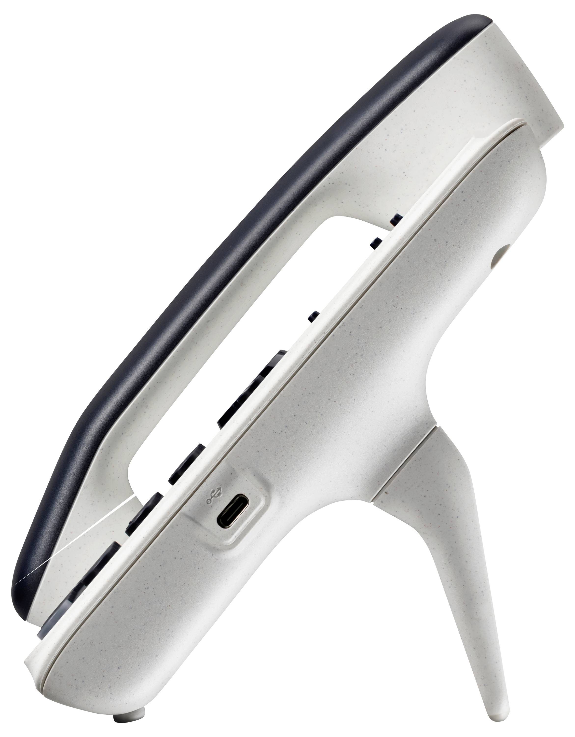 Vue latérale d'un appareil portatif compact sur un support, avec un bord supérieur noir et un port USB-C visible.