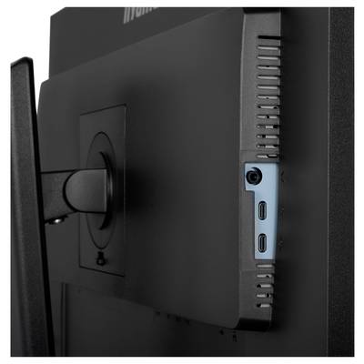 Vue arrière d'un moniteur d'ordinateur mettant l'accent sur les ports de connectivité : une prise audio, deux ports USB-C et la fixation du bras de montage.