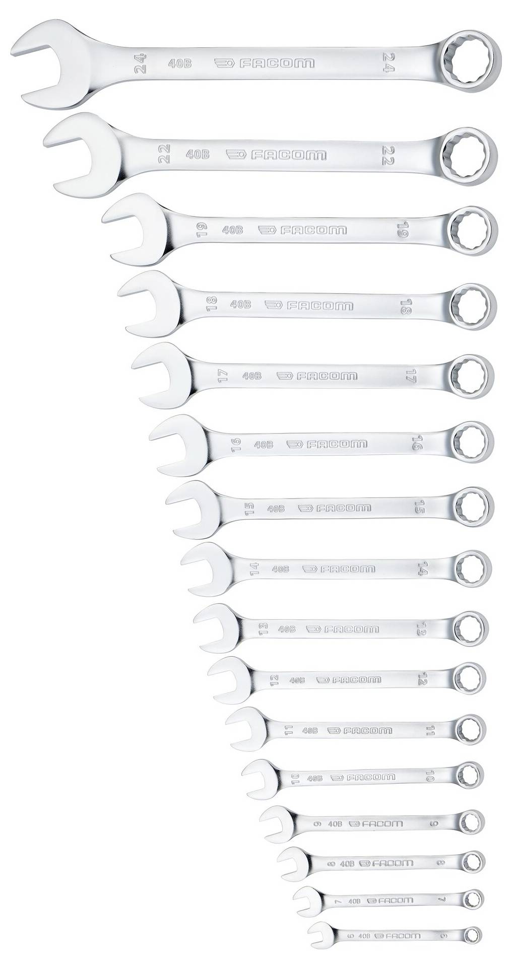 Un ensemble de 16 clés mixtes en argent, disposées par ordre de taille du plus petit au plus grand, alignées verticalement sur un fond blanc.