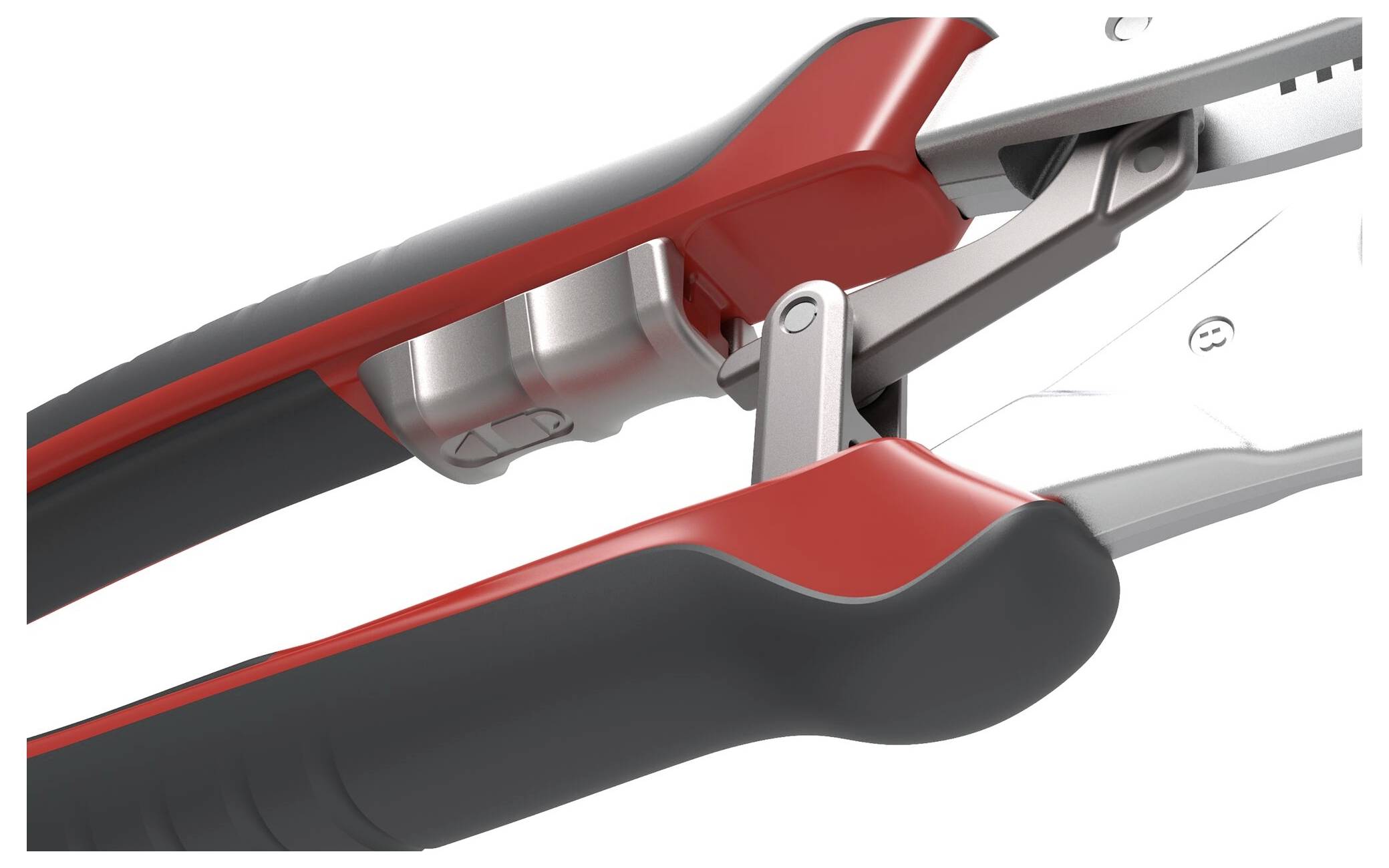 Gros plan d'un outil rouge et noir, probablement un sécateur, avec des lames visibles conçues pour la coupe.