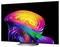 Un téléviseur à écran plat affiche un design spiral abstrait coloré sur un fond noir, montrant un papier peint tourbillon arc-en-ciel vibrant.
