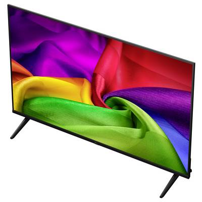 Téléviseur à écran plat avec un motif abstrait multicolore de tourbillon de tissu arc-en-ciel affiché à l'écran, présenté sur un support sur fond blanc.