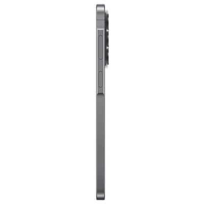 Vue latérale d'un smartphone argenté montrant le bouton d'alimentation et les contrôles de volume sur le bord.