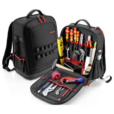 Sac à dos à outils KNIPEX noir ouvert montrant des outils à main organisés, tournevis, pinces, mètre à ruban, niveau et marteau sur un fond blanc.