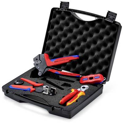 Étui de transport noir ouvert avec des inserts en mousse maintenant des outils de sertissage et de dénudage de fils de couleur rouge et bleu.