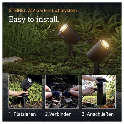 Publicité pour le système d'éclairage de jardin STEINEL 24V montrant deux projecteurs installés et trois étapes : '1. Positionner', '2. Connecter', '3. Brancher', avec 'Facile à installer.'
