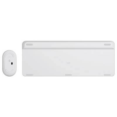Souris sans fil blanche à côté d'une base d'ordinateur portable blanc ou d'une tablette fine, vue de l'arrière.