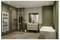 Salle de bain moderne avec murs verts, douche à l'italienne, double vasque, radiateur sèche-serviettes et baignoire îlot sur la droite.