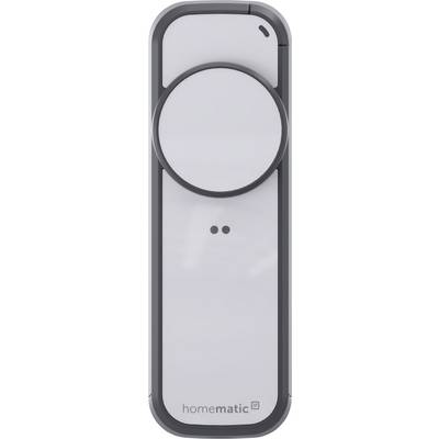 Contrôleur de thermostat pour maison intelligente de couleur grise avec un grand cadran circulaire et deux petits points indicateurs, étiqueté 'homematic' en bas.