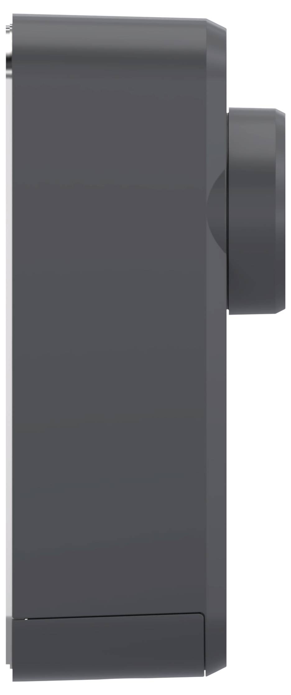 Gros plan d'un appareil ou conteneur rectangulaire gris foncé montré de côté, avec une protubérance cylindrique sur la droite.