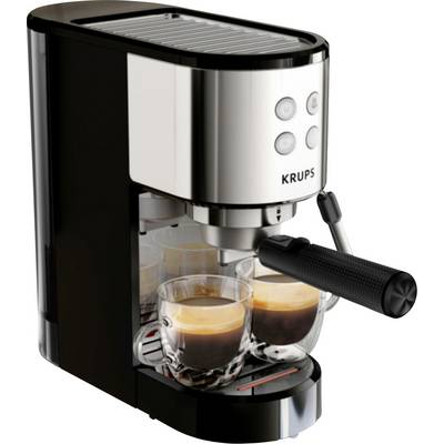 Machine à espresso Krups préparant deux shots dans des tasses en verre, avec le porte-filtre et les boutons de commande visibles.